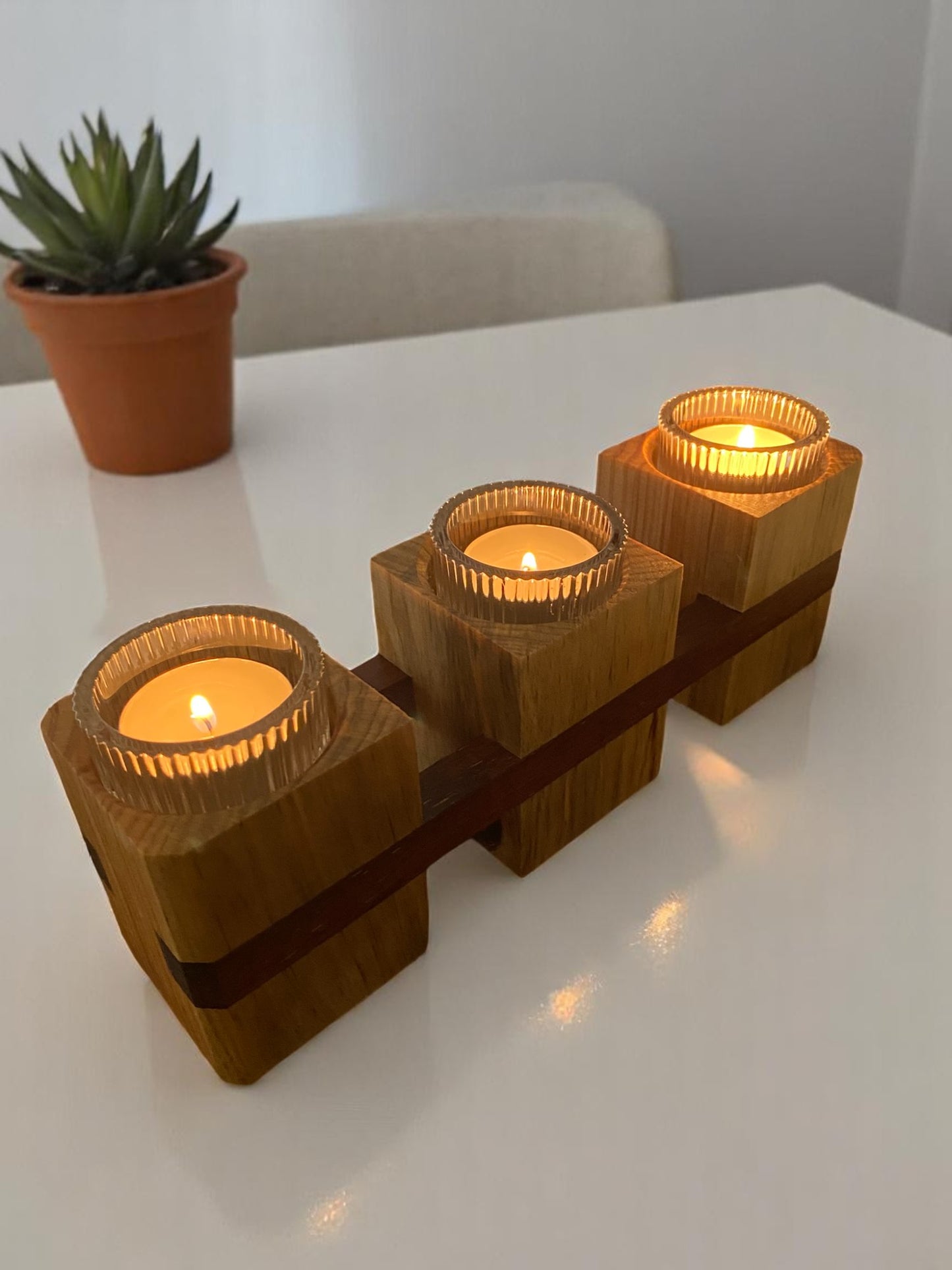 Three towers candle holder