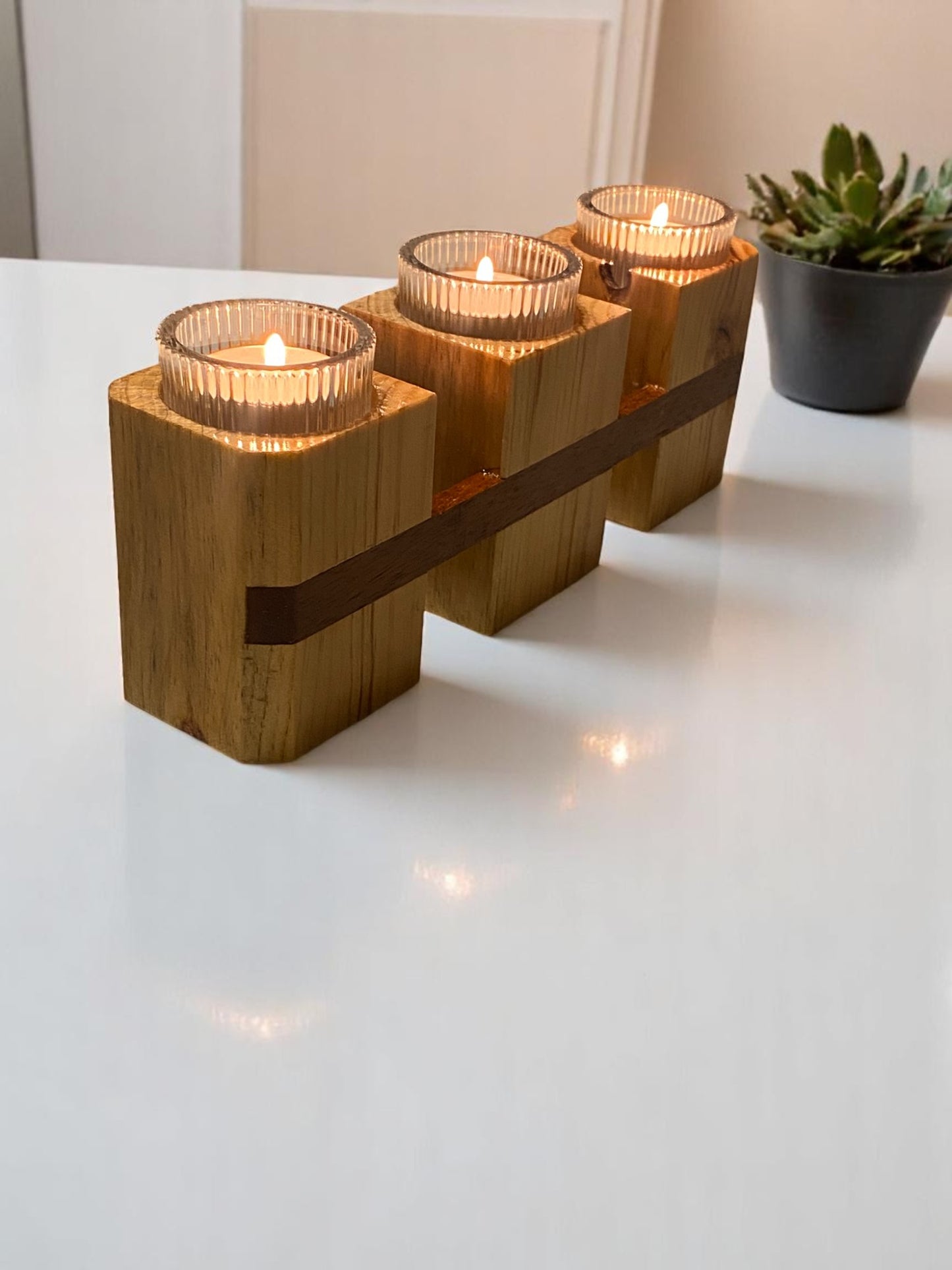 Three towers candle holder